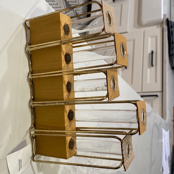 Anthropologie Accents Anthropologie Staggered Vase In Gold Poshmark